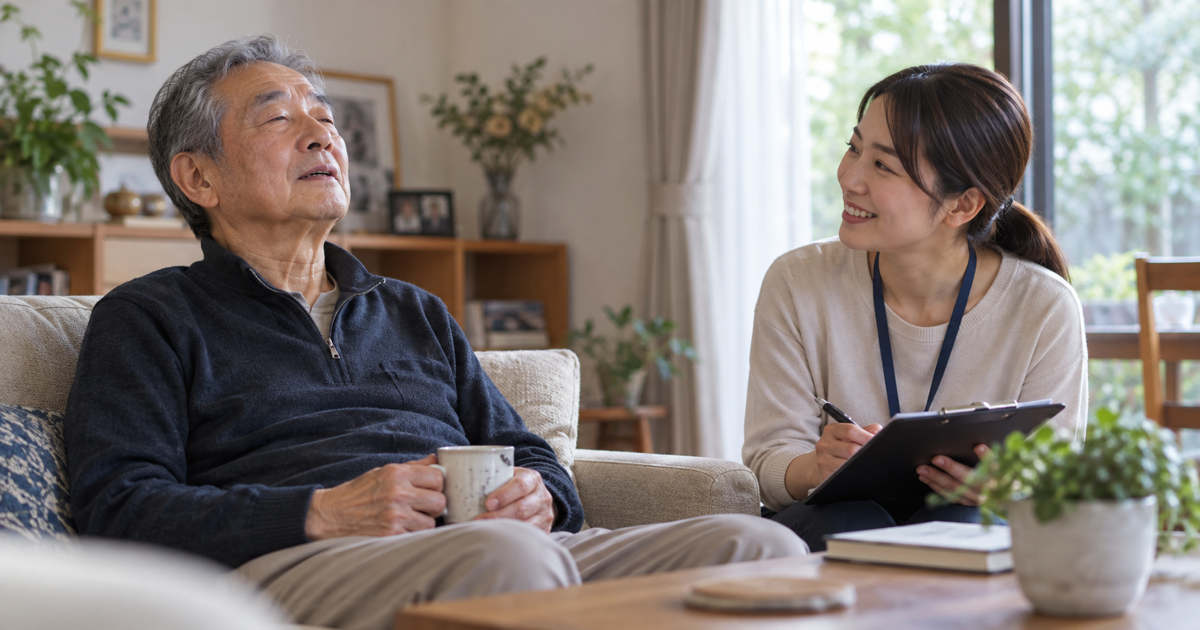 発話練習中に高齢男性が休憩し言語聴覚士が体調を確認している